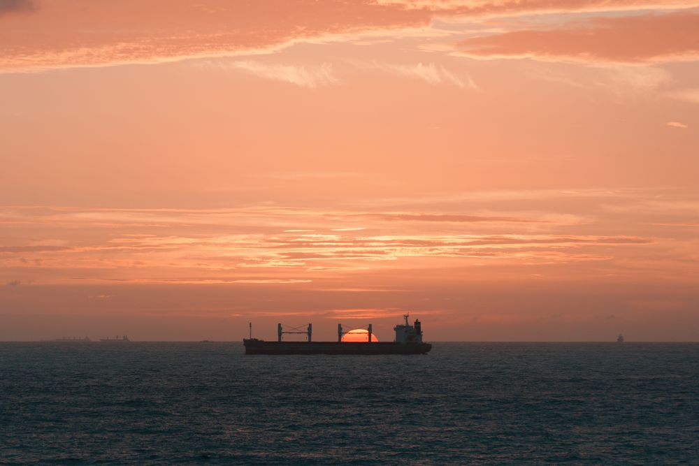 Sunset over open water, photograph 11