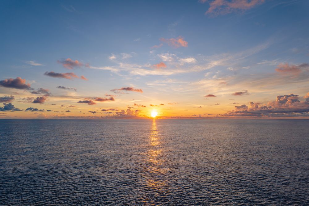 Sunset over open water, photograph 17