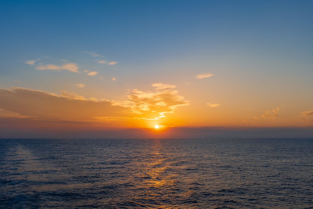 Sunset over open water, photograph 4